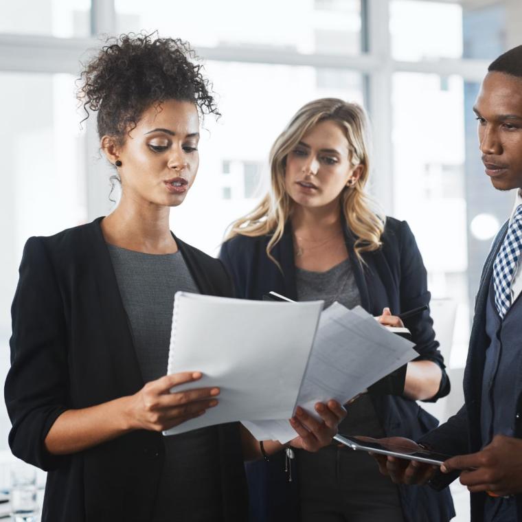 Corporate, teamwork and documents with business people in office for legislation, privacy policy and lawyer. Case proposal, planning and legal counsel with employees in law firm for justice