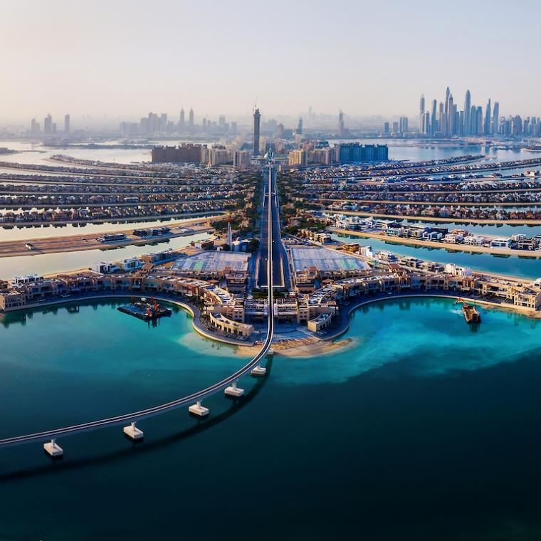 The Palm island panorama with Dubai marina in the background aerial