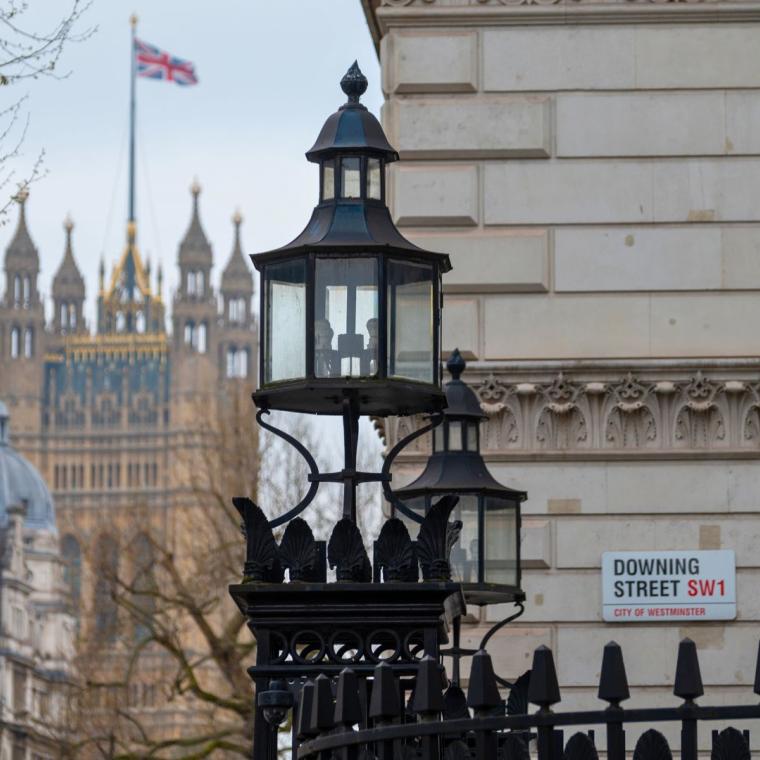Westminster, walking on streets with old houses in spring, city life, government and parliament district in London, UK