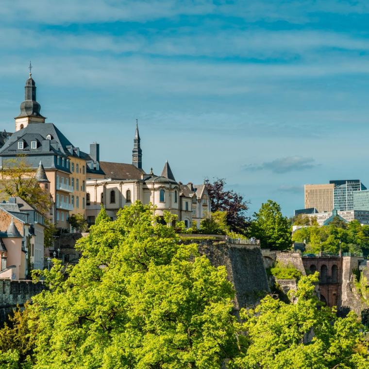 Horizontal Aerial panorama view of Luxembourg-City with the fortress wall, the Casemates, and Kirchberg skyline
