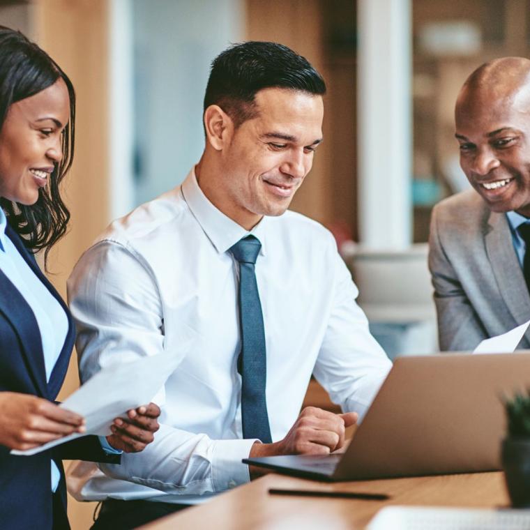 Diverse colleagues collaborating over a project