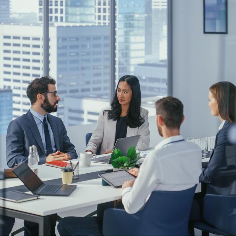 Boardroom with CFO discussing finances