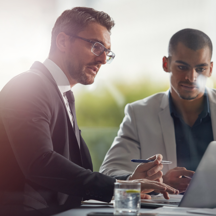 Business people, laptop and planning while reading email information online with lawyer and client . Men together in meeting discussion with company wifi internet to do research on case for advice