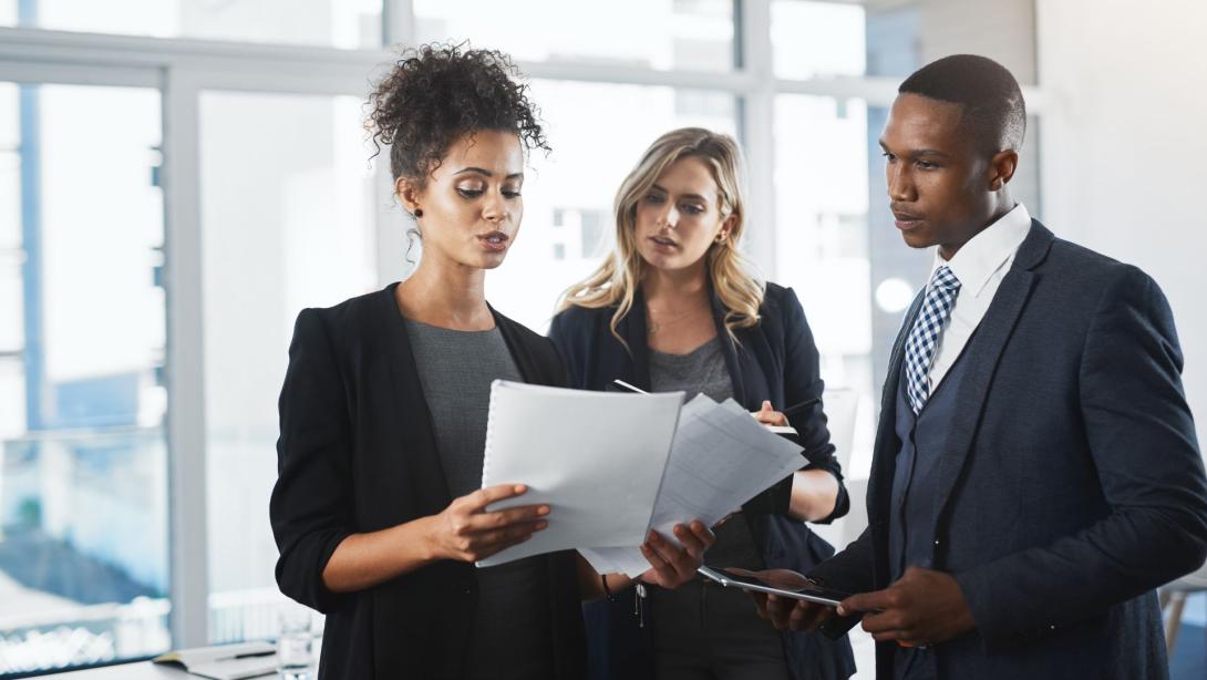 Corporate, teamwork and documents with business people in office for legislation, privacy policy and lawyer. Case proposal, planning and legal counsel with employees in law firm for justice