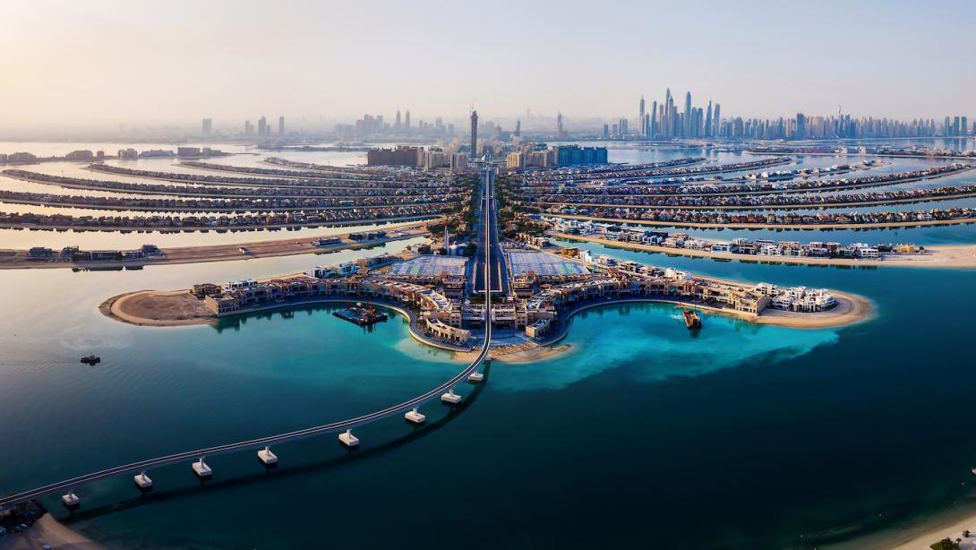 The Palm island panorama with Dubai marina in the background aerial