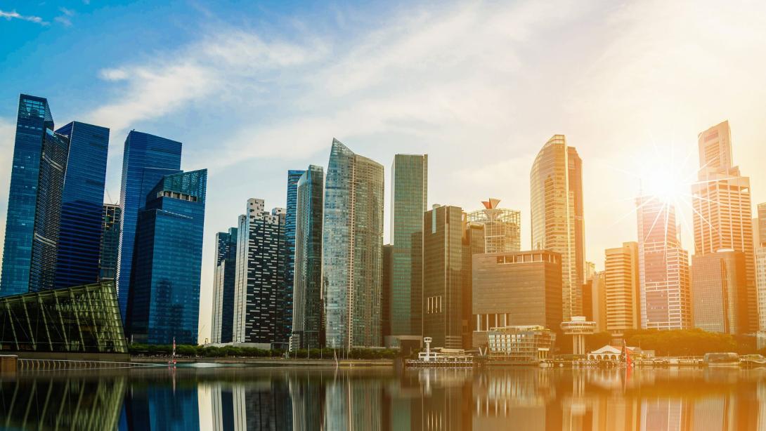 Singapore city skyline of business district downtown at sunset