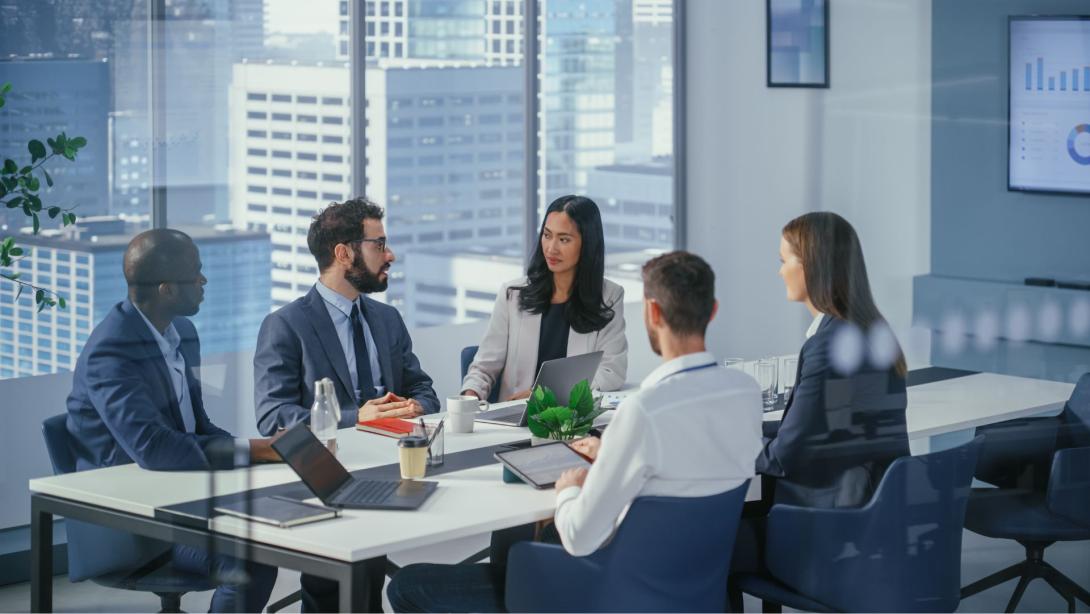 Boardroom with CFO discussing finances