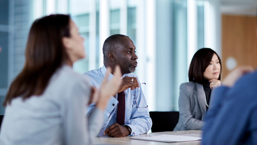 Business people listening in meeting