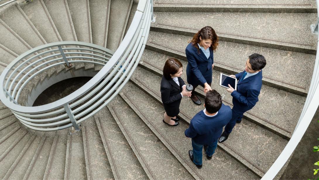 Top view of business people standing at the steps
