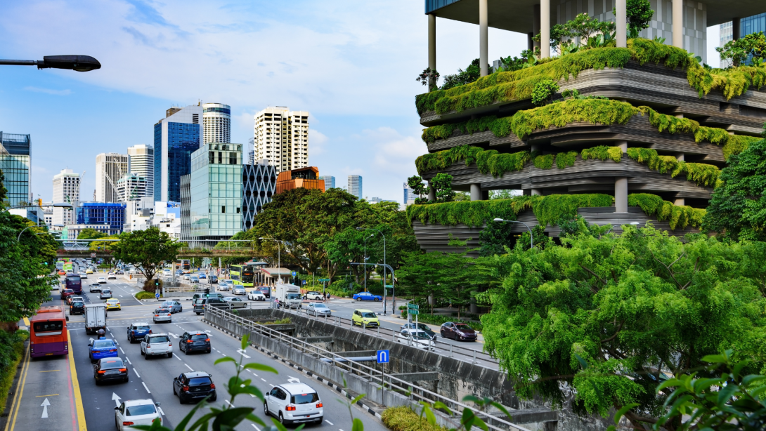 Urban life in Singapore: skyscrapers and tropical plants under deep blue sky